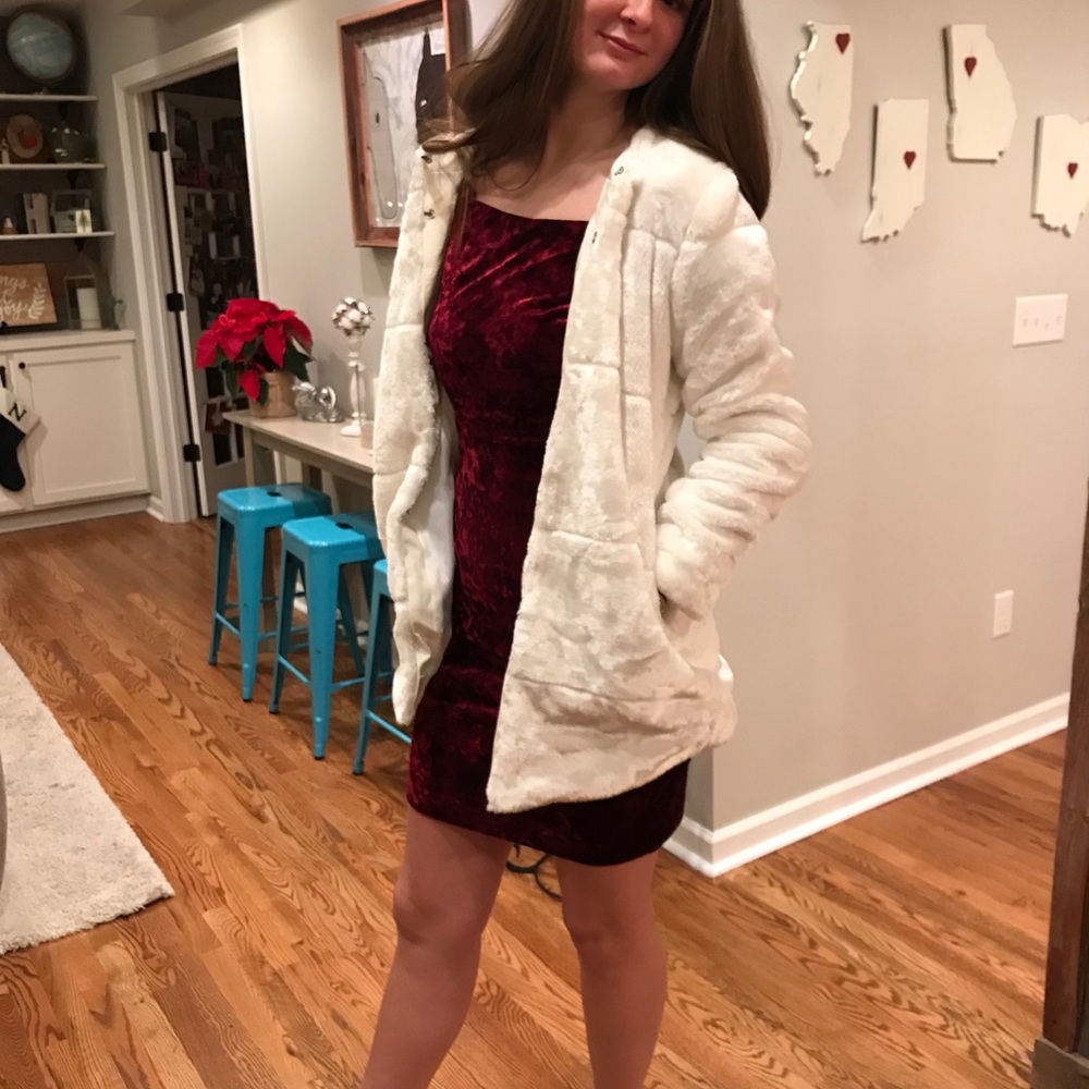 White faux fur coat